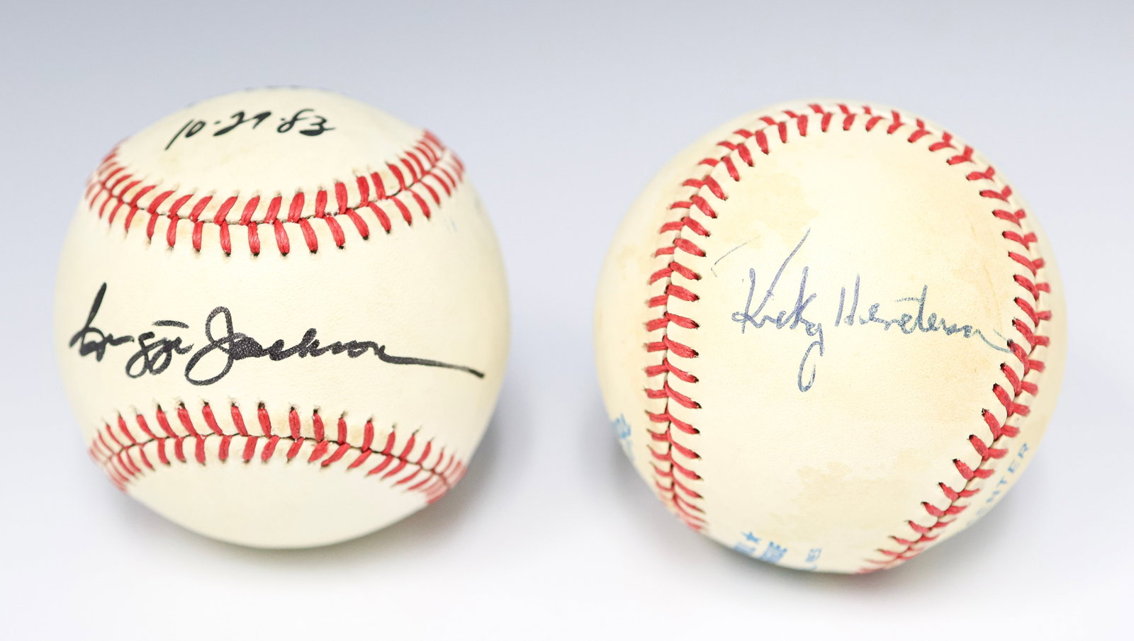 Oakland A’s Legends Signed Baseball Pair - Rickey Henderson & Reggie Jackson (1 of 8)