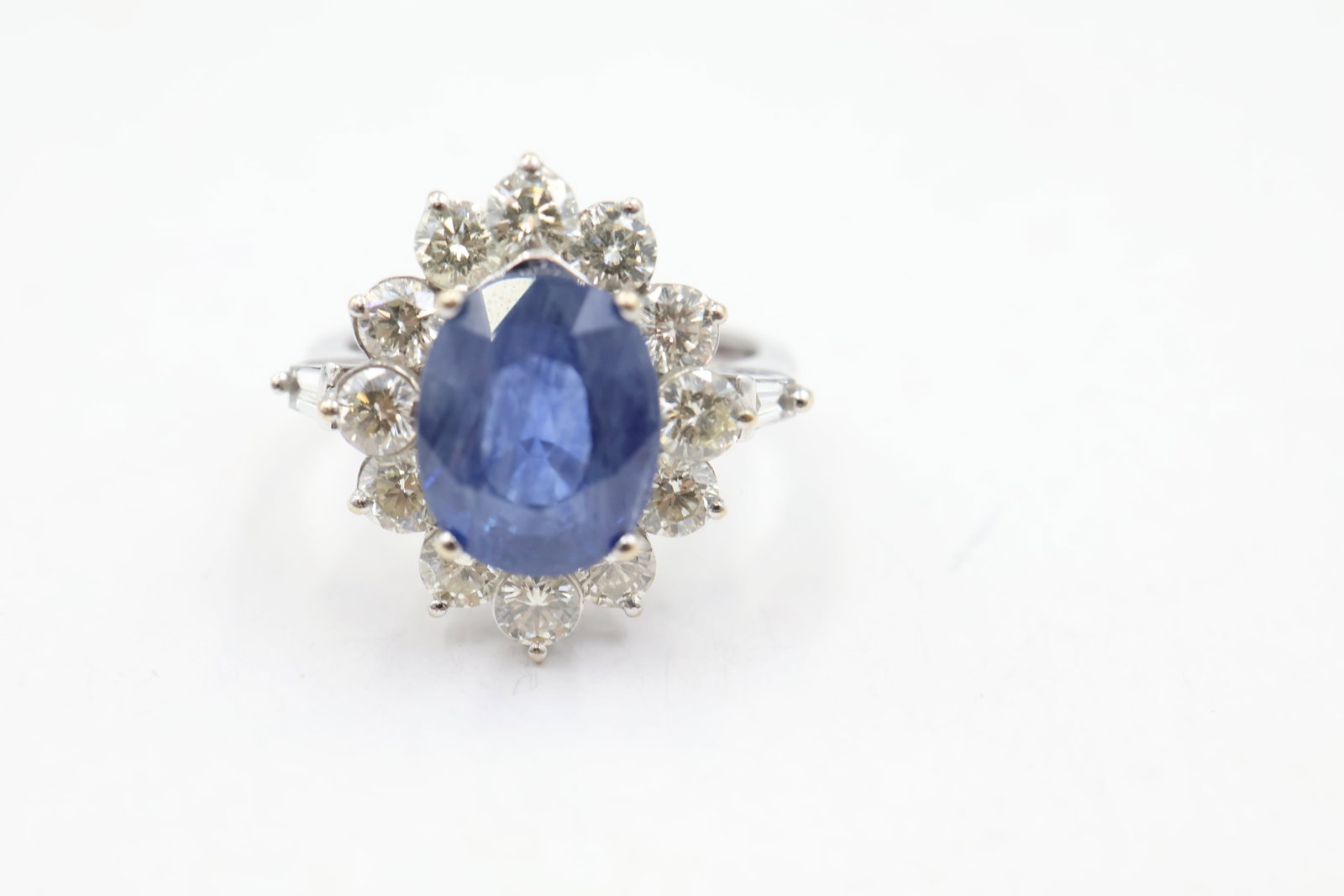 14k White Gold & 5.80 ct Burmese Sapphire Ring: 5.80 carat Natural Burmese Sapphire, accompanied by a GFCO Gem Lab report. The sapphire is noted as Burma origin and standard heat treated, with brilliant crown and step pavilion cuts. A striking coll