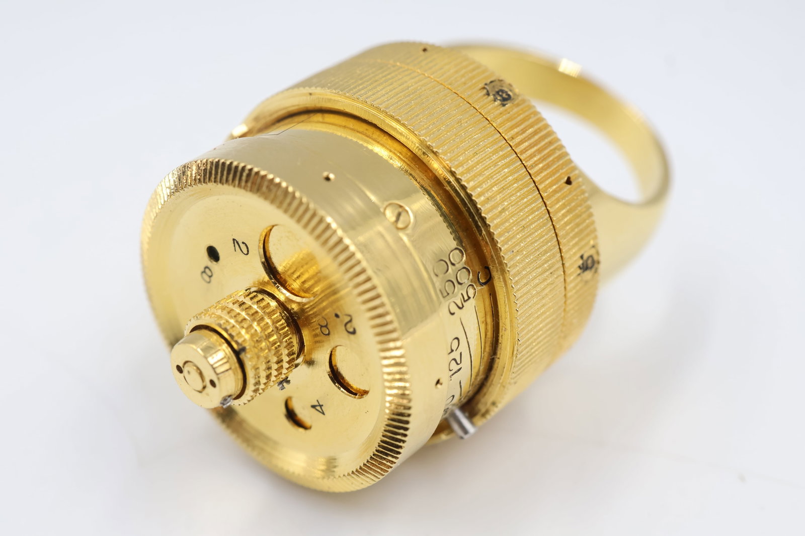 Gold Plated spy Camera Ring: Unusual novelty ring featuring a concealed miniature camera design with a gold-plated finish. A distinctive collectible conversation piece.