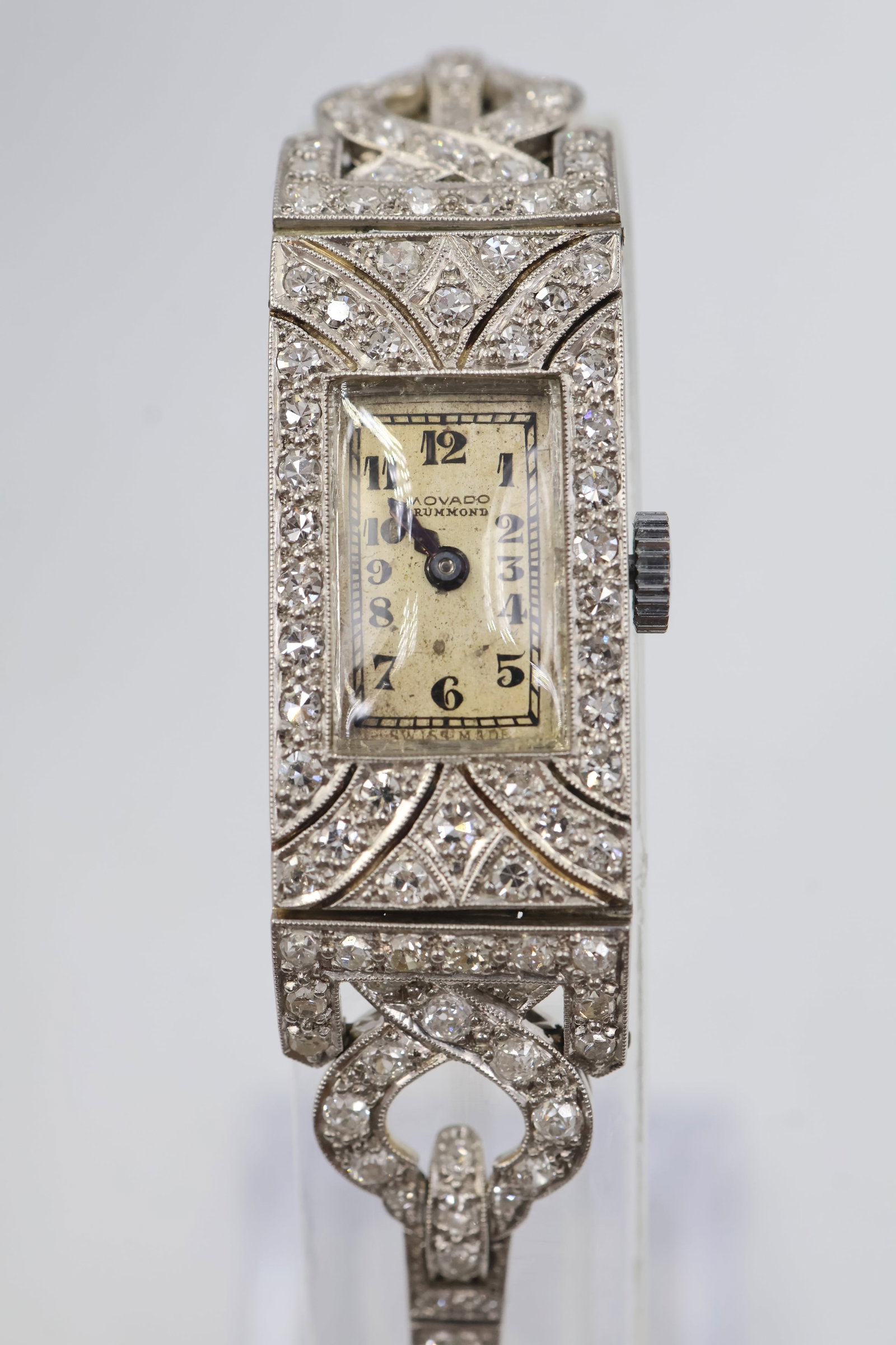 Movado Drummond Diamond Watch: Movado Drummond wristwatch accented with sparkling diamonds and featuring the brand’s signature minimalist aesthetic. A sophisticated timepiece combining contemporary design with refined