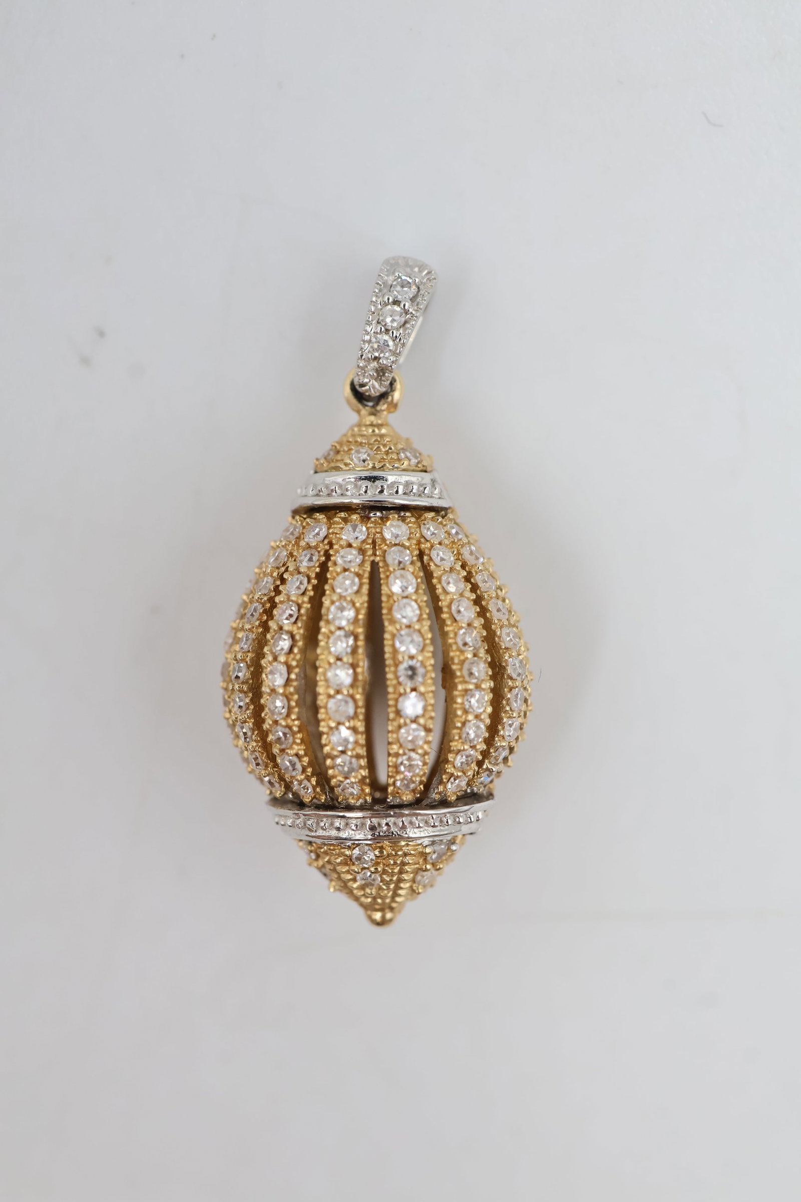 14k Gold & Diamond Pendant: 14K gold pendant accented with sparkling diamonds. A timeless and versatile fine jewellery piece offering classic brilliance and refined elegance. Weight 3.7 grams.