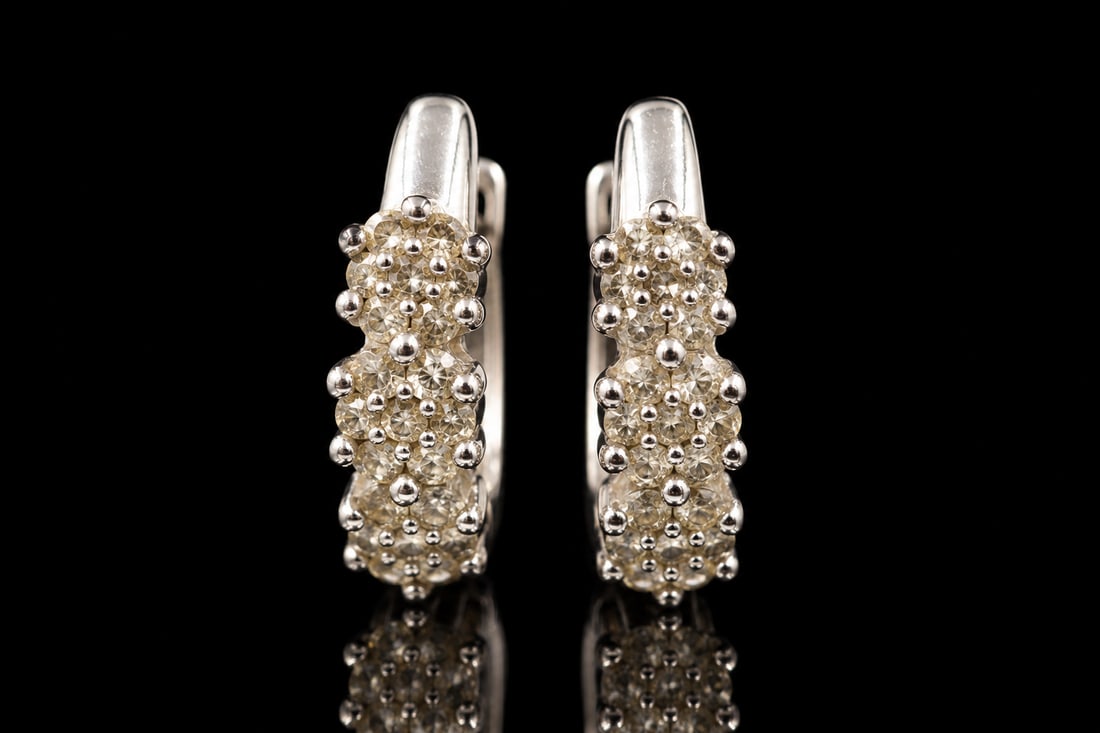 10k White Gold & Diamond Huggies: Elegant 10K white gold huggies set with 36 sparkling diamonds. Total weight: 2.32 grams.