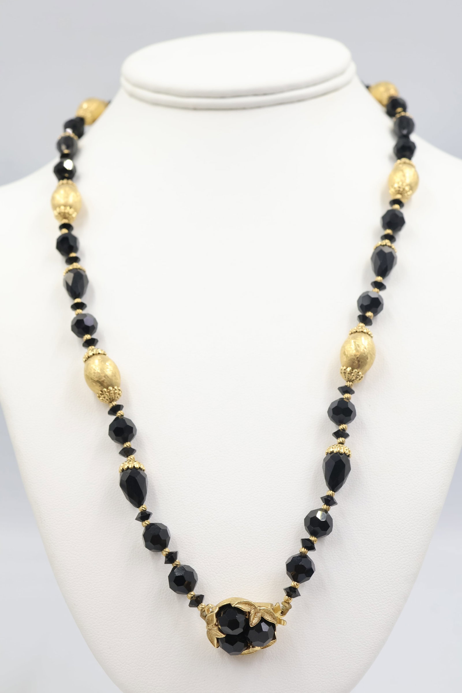 Sherman Gold Plate & Crystal Necklace: Vintage Sherman necklace featuring a gold-plated setting accented with sparkling faceted crystals. A classic example of Sherman costume jewellery