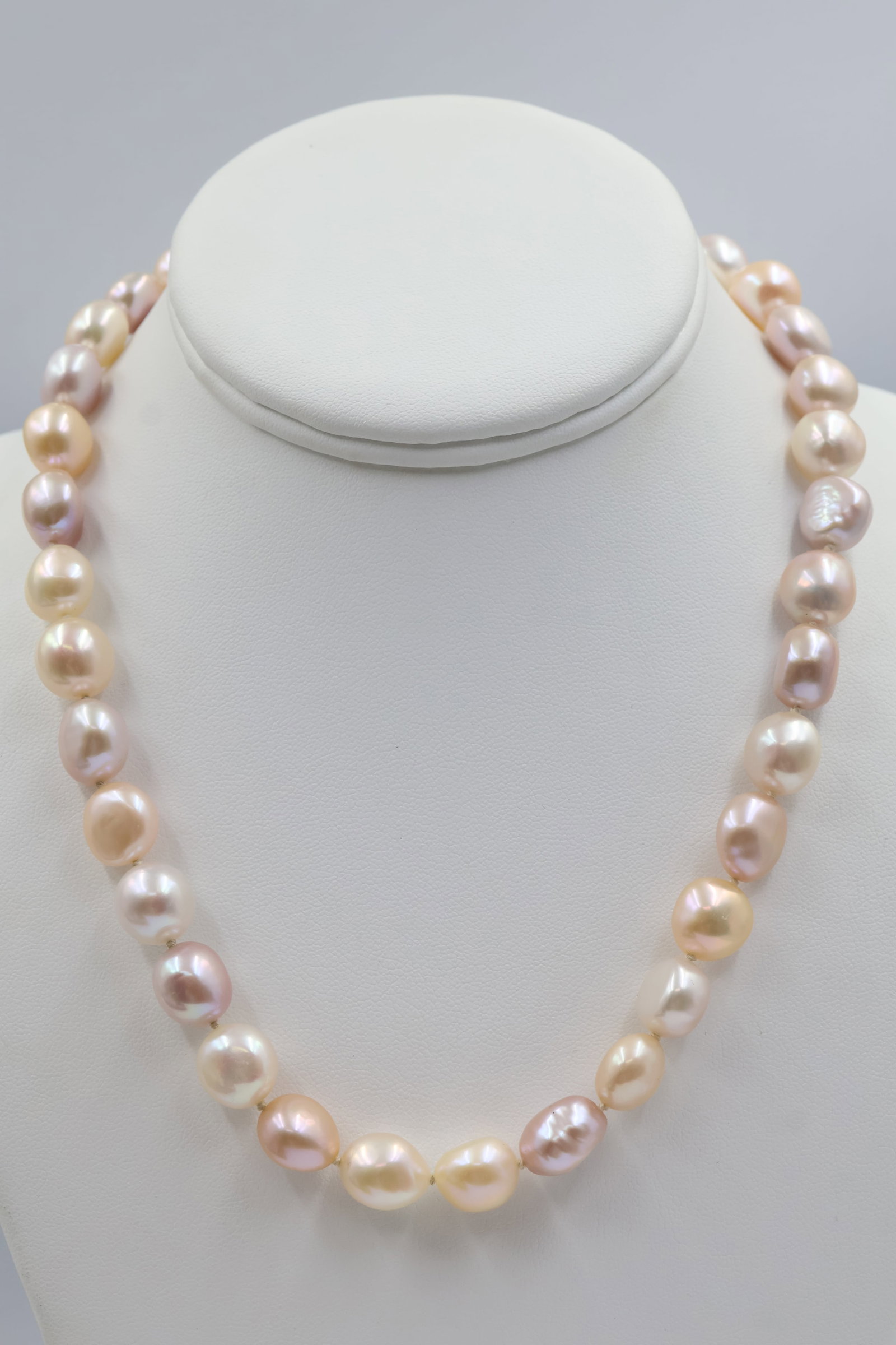 Pamela Lauz Champagne Freshwater Pearls: Pamela Lauz necklace crafted in sterling silver and featuring lustrous champagne freshwater pearls. A refined contemporary design showcasing soft colour, natural beauty and timeless elegance.