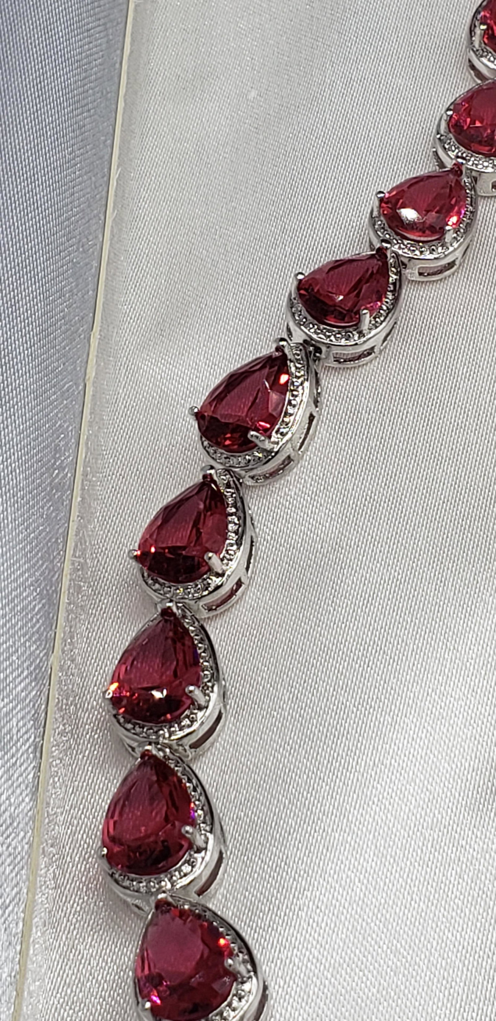6.00 CTW Ruby Tennis Bracelet: 6.00 CTW Pear-shaped rubies, tennis style bracelet