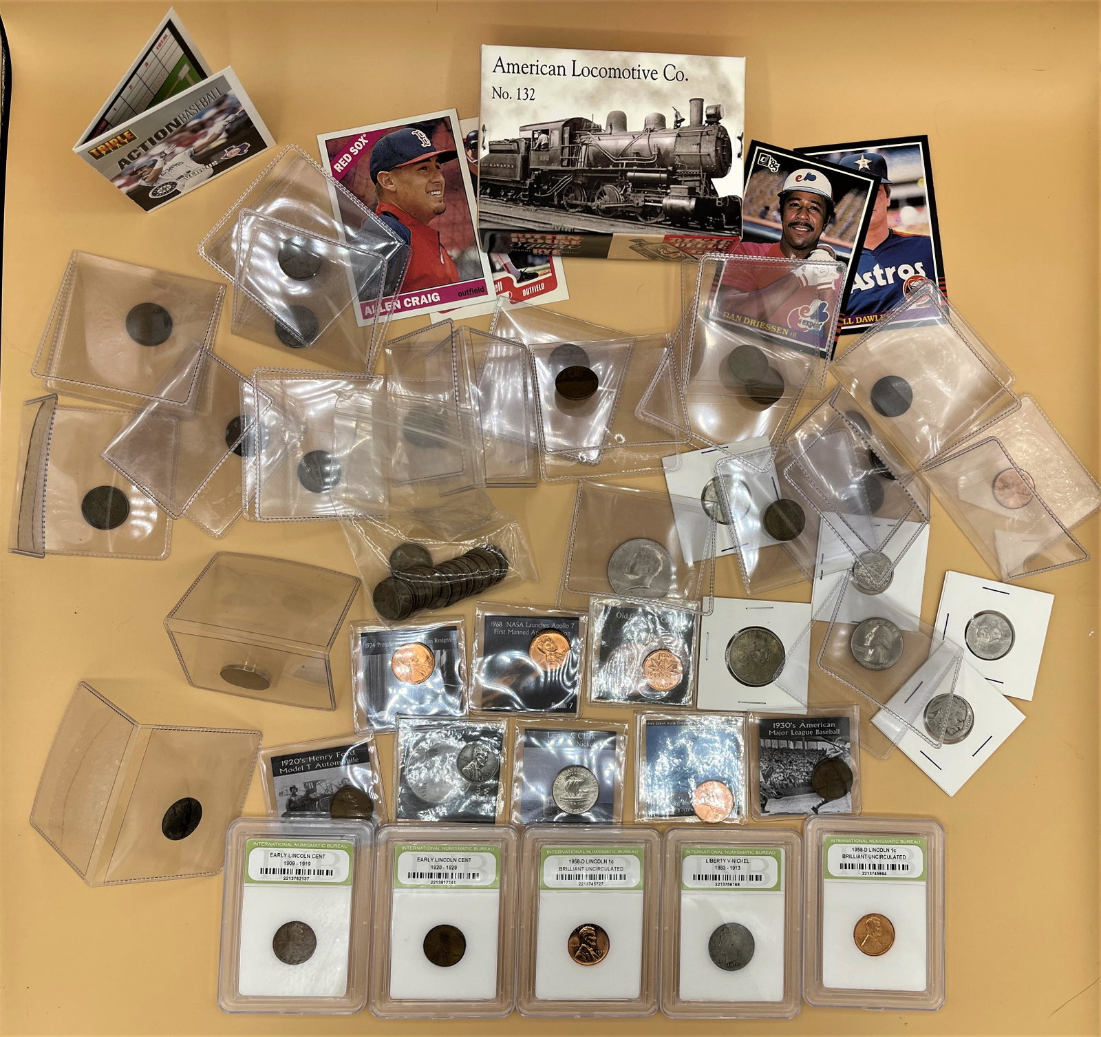 COLLECTORS DREAM American Locomotive Cco. No.132: Dozens upon dozens of slabbed coins, in coin holders, baseball cards, and more all in a super collectible Alco Train Co. Box