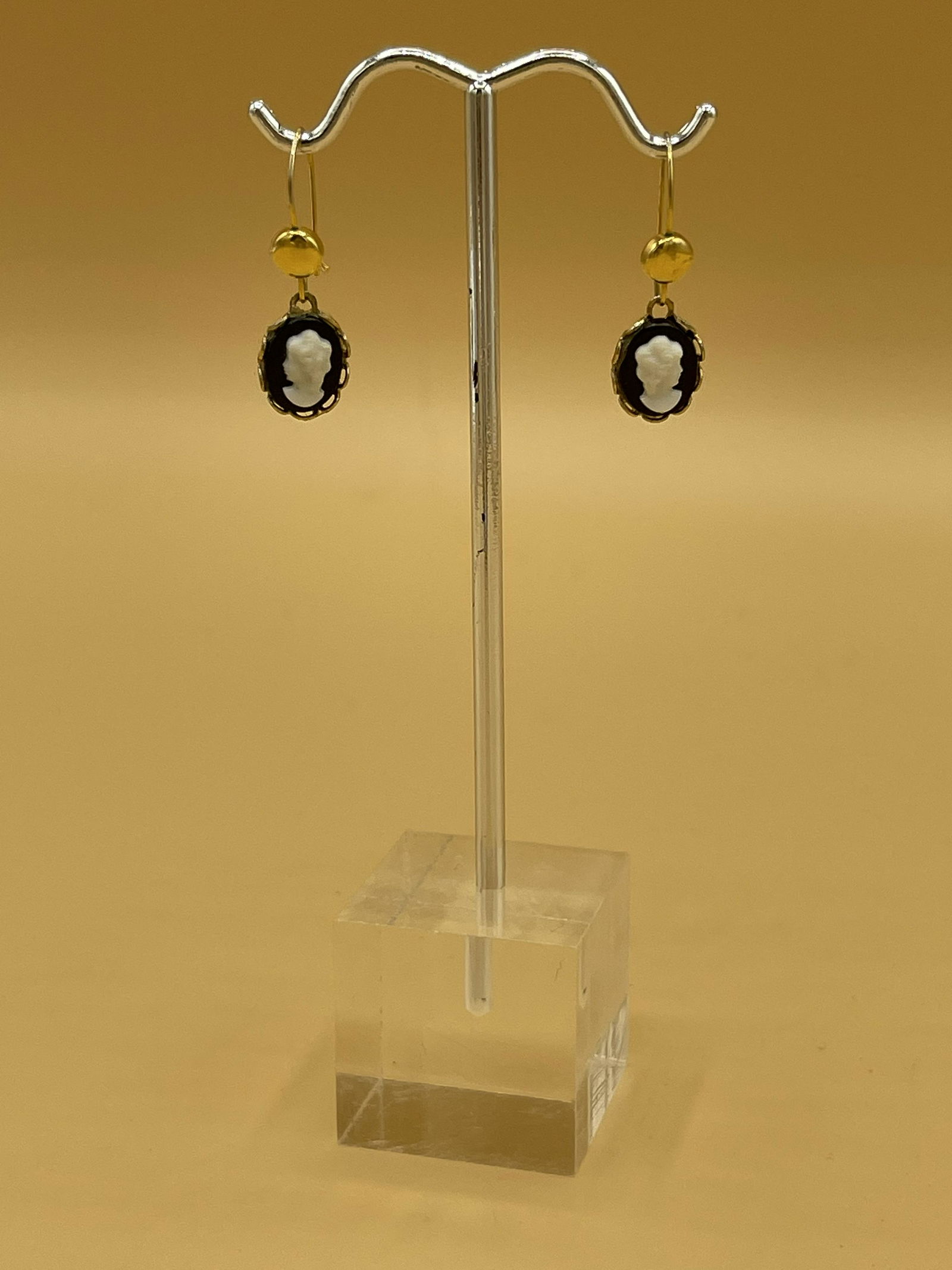 Antique Black & White Cameo in 24KT Gold Earrings: Antique black vintage Cameo Silhouette set in gorgeous 24K gold plated settings with attached long elegant wires