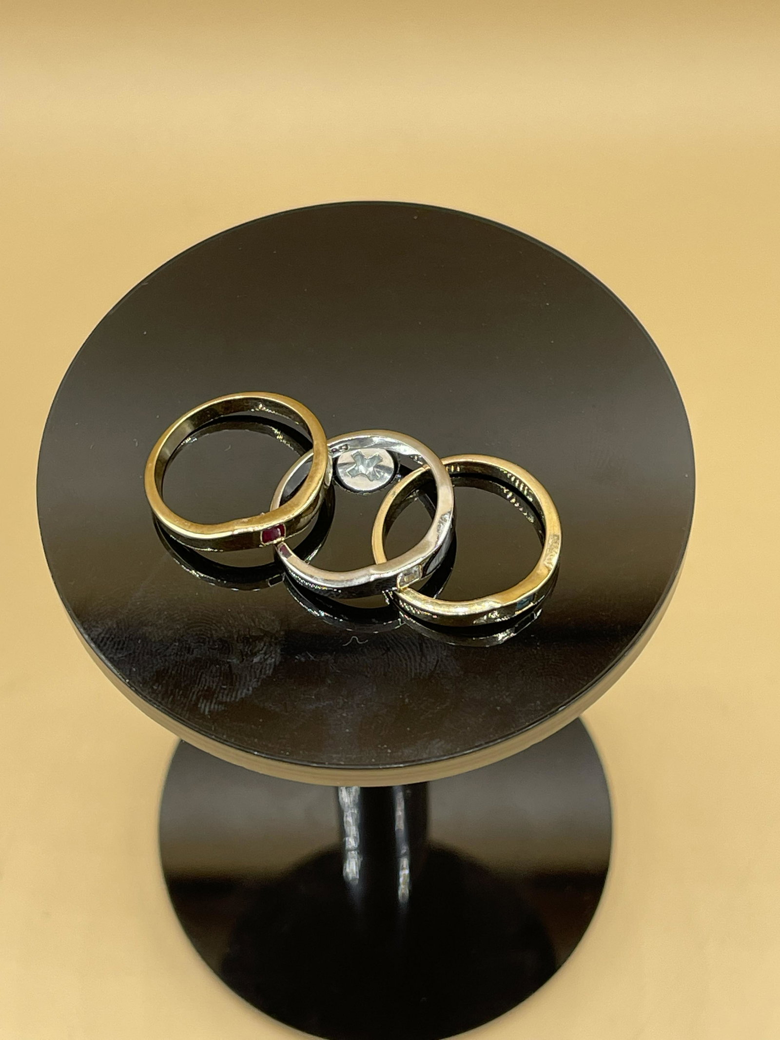 (3) 14K White & Yellow Gold Stackable Rings: 3 Total 14K White & Yellow Gold Stackable Rings with a ruby, diamond, and aquamarine centered in each ring individually