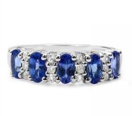 Double Tanzanite Sterling Silver Band: Double Tanzanite Sterling Silver Band, solid 925, differentiating blue & white tanzanite in stunning faceted cuts along the band. New, size 7, total weight is