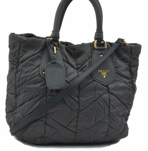 Authentic PRADA Quilted Nylon 2Way Shoulder Hand Bag: This item qualifies for FREE DOMESTIC SHIPPING to customers in the USA Brand: PRADA Style: Hand Bag Country/Region of Manufacture: Italy Type: Hand Bag Bag Length: 11inches (28cm) Department: Women Ba