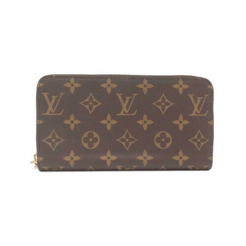 Authentic LOUIS VUITTON Monogram Wallet M42616: This item qualifies for FREE DOMESTIC SHIPPING to customers in the USA Brand: Louis Vuitton Size: W X H X Gusset (W) :19Cm X 10Cm X 2Cm Style: Purse Mpn: M42616 Color: Marron / Gold Parts Type: Purse
