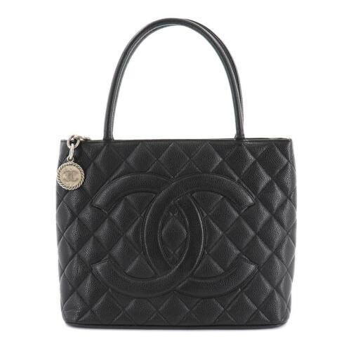 Authentic CHANEL Caviar Skin Leather Tote Bag Black: This item qualifies for FREE DOMESTIC SHIPPING to customers in the USA Brand: Chanel Size H: 9.45 Inch Style: Tote Bag Size D: 5.91 Inch Material: Caviar Skin Leather Weight: 1.65 Lb Color: Black Hand
