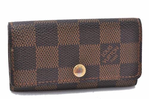 Authentic Louis Vuitton Damier Multicles 4 Key Case: This item qualifies for FREE DOMESTIC SHIPPING to customers in the USA Brand: Louis Vuitton MPN: Does not apply Type: Key Case Style: Key Case Color: Brown Serial Number: TH2077 Department: Unisex Bag