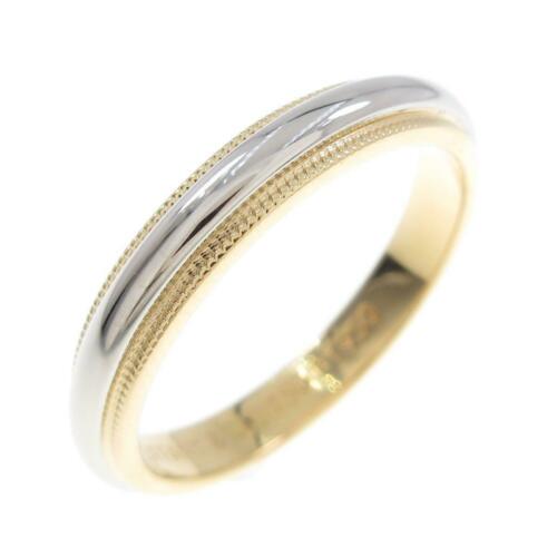 Authentic Tiffany Mirugurein ring: This item qualifies for FREE DOMESTIC SHIPPING to customers in the USA Brand: Tiffany Size: 20.0 (Jpn Size) Material: 750Yg/Pt Actualsize: Width :3.5Mm Gender: Ladies The BIDHAUS Guarantee: Photos des