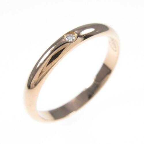 Authentic Cartier wedding ring: This item qualifies for FREE DOMESTIC SHIPPING to customers in the USA Brand: Cartier Accessories: No Warranty Card Material: 750Pg Actualsize: Width :2.5Mm Gender: Ladies Centerstone: Diamond Size: 1