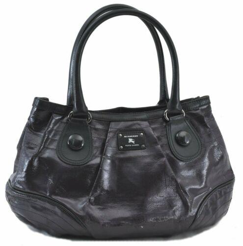Authentic Burberry BLUE LABEL Shoulder Tote Bag PVC: This item qualifies for FREE DOMESTIC SHIPPING to customers in the USA Brand: Burberry Style: Tote Bag Country/Region of Manufacture: Japan Type: Tote Bag Bag Length: 18.1inches (46cm) Department: Wom