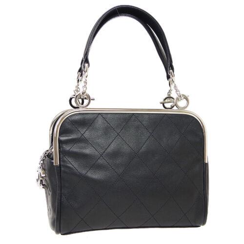 Authentic CHANEL Quilted Jumbo CC Hand Tote Bag: This item qualifies for FREE DOMESTIC SHIPPING to customers in the USA Size: Medium Pattern: Quilted Accents: Quilted Features: Bag Charm Pockets Model: Hand Tote Bag Color: Black Country/Region of Ma