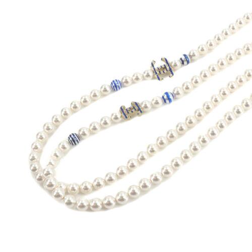 Authentic CHANEL Coco Logos Long Necklace White Gold: This item qualifies for FREE DOMESTIC SHIPPING to customers in the USA Brand: Chanel Gender: Women Style: Necklace Weight: 3.5Oz Color: Whitebluegold Engraved: A19C The BIDHAUS Guarantee: Photos descr