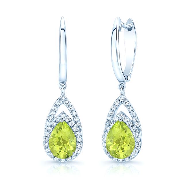Peridot And Diamond Earrings In 14k White Gold (1/3: This item qualifies for FREE DOMESTIC SHIPPING to customers in the USA Exquisite Elegance Defines These 14k White Gold Earrings Adorned With Pear Shaped Peridot Gemstones Surrounded By Brilliant Cut D