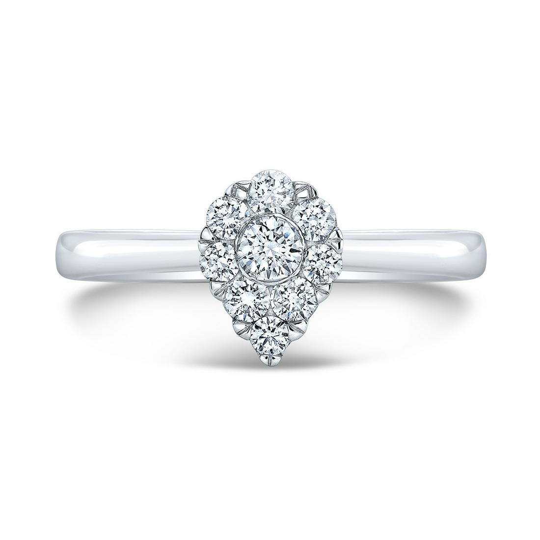Diamond Illusion Solitaire Teardrop Ring With Plain: This item qualifies for FREE DOMESTIC SHIPPING to customers in the USA Elegant Illusion Solitaire Teardrop Ring Features 0.45ctw Of Round Brilliant Diamonds Set In 14k White Gold 14k White Gold Corone