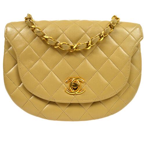 Authentic CHANEL Quilted Chain Shoulder Bag: This item qualifies for FREE DOMESTIC SHIPPING to customers in the USA Size: Medium Pattern: Matelasse Accents: Quilted Features: Chain Strap Model: Chain Shoulder Color: Beige Country/Region of Manuf