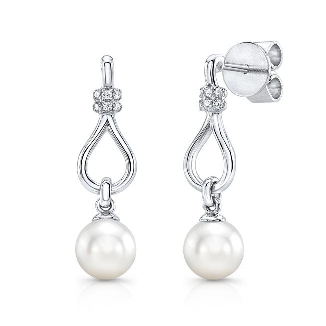 Fresh Water Pearl And Diamond Drop Earrings In 14k: This item qualifies for FREE DOMESTIC SHIPPING to customers in the USA Dainty And Modern Drop Earrings Feature White Freshwater Pearls Accented By 0.04 Carats Of Round Brilliant Diamonds Set In 14k Wh
