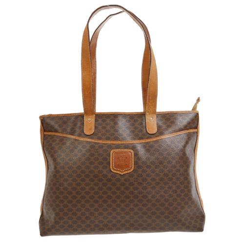 Authentic CELINE Macadam Pattern Hand Bag: This item qualifies for FREE DOMESTIC SHIPPING to customers in the USA Size: Medium Pattern: Macadam Accents: Logo Features: Inner Pockets Model: Hand Bag Color: Brown Country/Region of Manufacture: I
