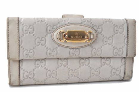 Authentic GUCCI Guccissima Leather Wallet White: This item qualifies for FREE DOMESTIC SHIPPING to customers in the USA Brand: GUCCI Style: Wallet Country/Region of Manufacture: Italy Type: Wallet Serial Number: 1461992888 Department: Women Bag