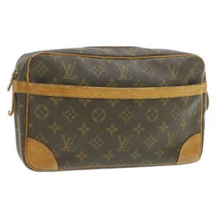 Authentic LOUIS VUITTON Monogram Compiegne 28 Clutch: This item qualifies for FREE DOMESTIC SHIPPING to customers in the USA Size: W28 x H18 x D7cm(Approx) Product Line: M51845 Country/Region of Manufacture: France Material: Monogram Canvas