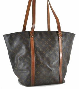 Authentic Louis Vuitton Monogram Sac Shopping Tote Bag: This item qualifies for FREE DOMESTIC SHIPPING to customers in the USA Brand: Louis Vuitton Style: Tote Bag Country/Region of Manufacture: France Type: Tote Bag Serial Number: NO0946 Department: