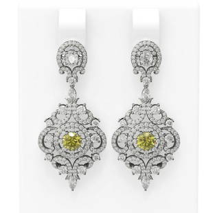 5.85 ctw Fancy Yellow Diamond Earrings 18K White Gold: This item qualifies for FREE DOMESTIC SHIPPING to customers in the USA 5.85 ctw Fancy Yellow Diamond Earrings 18K White Gold Designer Brand Luxury Jewelrymade in the USA Suggested Retail Price: 