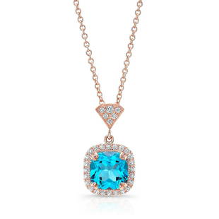 Blue Topaz Cushion And Diamond Halo Pendant In 14k Rose: This item qualifies for FREE DOMESTIC SHIPPING to customers in the USA 14k Rose Gold Pendant Showcasing An 7mm Cushion Cut Blue Topaz Surrounded By A Pave Diamond (h-i/vs 0.15ctw) Halo. Includes