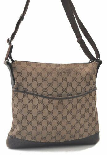 Authentic GUCCI GG Canvas Leather Shoulder Cross Body: This item qualifies for FREE DOMESTIC SHIPPING to customers in the USA Brand: GUCCI Style: Shoulder Bag Country/Region of Manufacture: Italy Type: Shoulder Bag Serial Number: 145857001998 Department:
