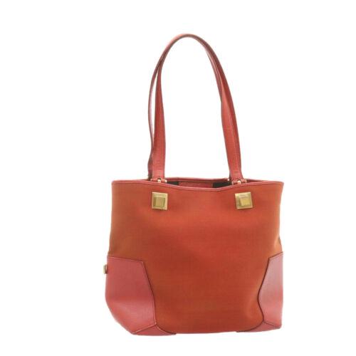 Authentic SALVATORE FERRAGAMO Tote Bag Red Canvas: This item qualifies for FREE DOMESTIC SHIPPING to customers in the USA Brand: Salvatore Ferragamo Country/Region of Manufacture: Italy Color: Red Type: unknown Material: Canvas Department: Woman Style
