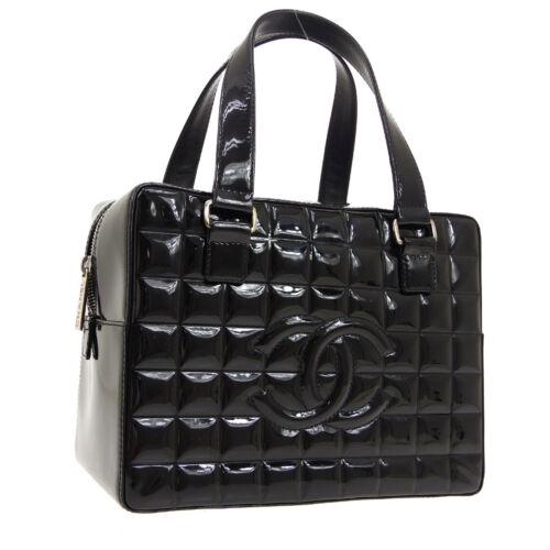 Authentic CHANEL Choco Bar Hand Bag: This item qualifies for FREE DOMESTIC SHIPPING to customers in the USA Size: Medium Accents: Logo Model: Hand Bag Country/Region of Manufacture: Italy Department: Women Style: Hand Bag Bag Height: 7.5