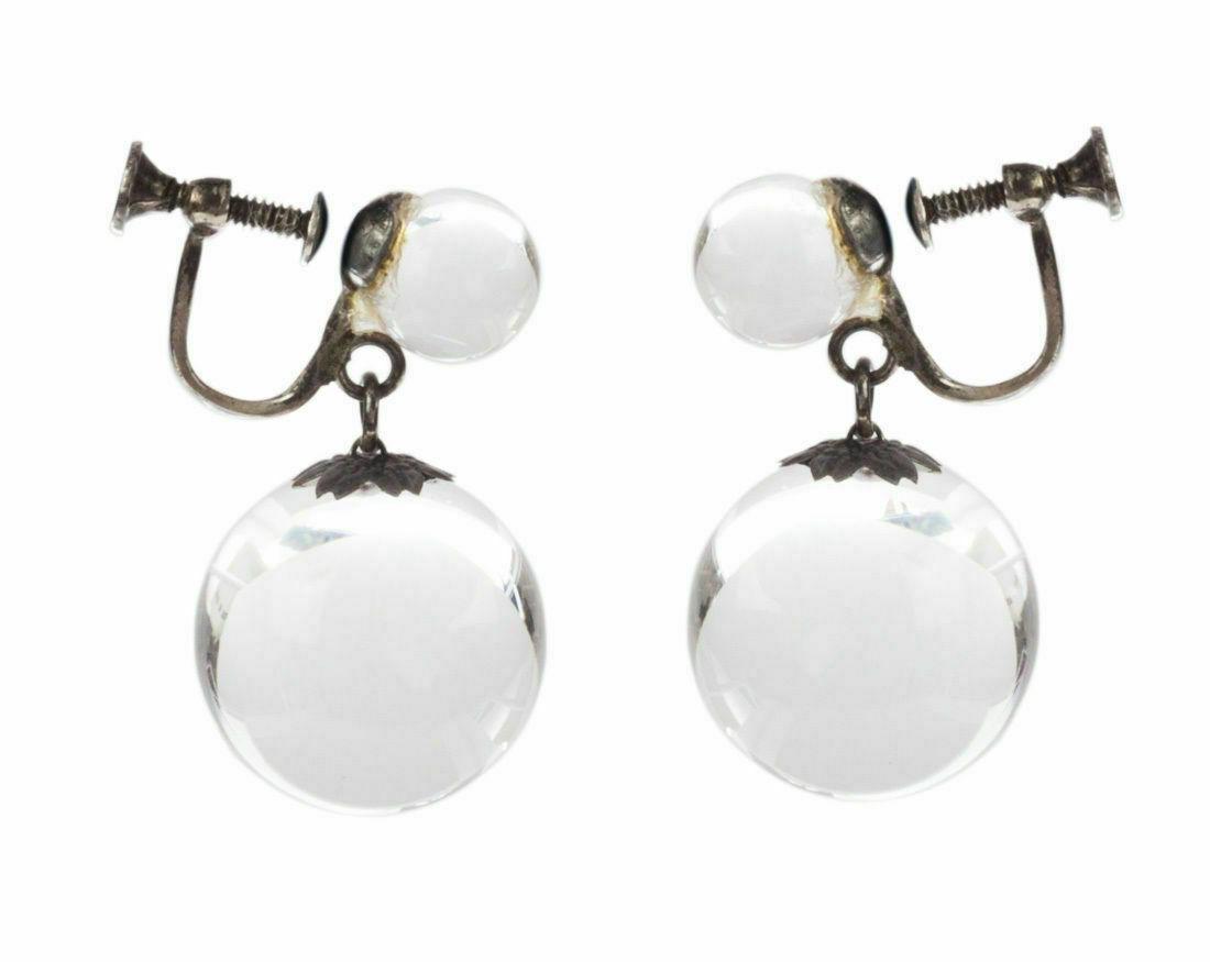 Art Deco Pools of Light Dangle Ball Earrings: This item qualifies for FREE DOMESTIC SHIPPING to customers in the USA Amazing rock crystal orbs in sterling silver settings with original patina. Circa 1930's to 1940's. Earrings are 1 1/8" long.Rock