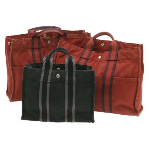 Authentic HERMES Fourre Tout PM MM Hand Bag Black Red: This item qualifies for FREE DOMESTIC SHIPPING to customers in the USA Size: W42 X H32 X D11Cm(Approx)W30 X H22 X D9Cm(Approx) Material: 100% Cotton Country/Region Of Manufacture: France Color: Black 