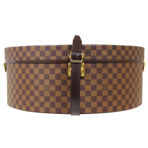 Authentic LOUIS VUITTON BOITE CHAPEAUX 50 RONDES HAT: This item qualifies for FREE DOMESTIC SHIPPING to customers in the USA Size: Extra Large Features: Adjustable Strap Inner Dividers Accents: Logo Color: Brown Model: Damier Year Manufactured: 1980-1989