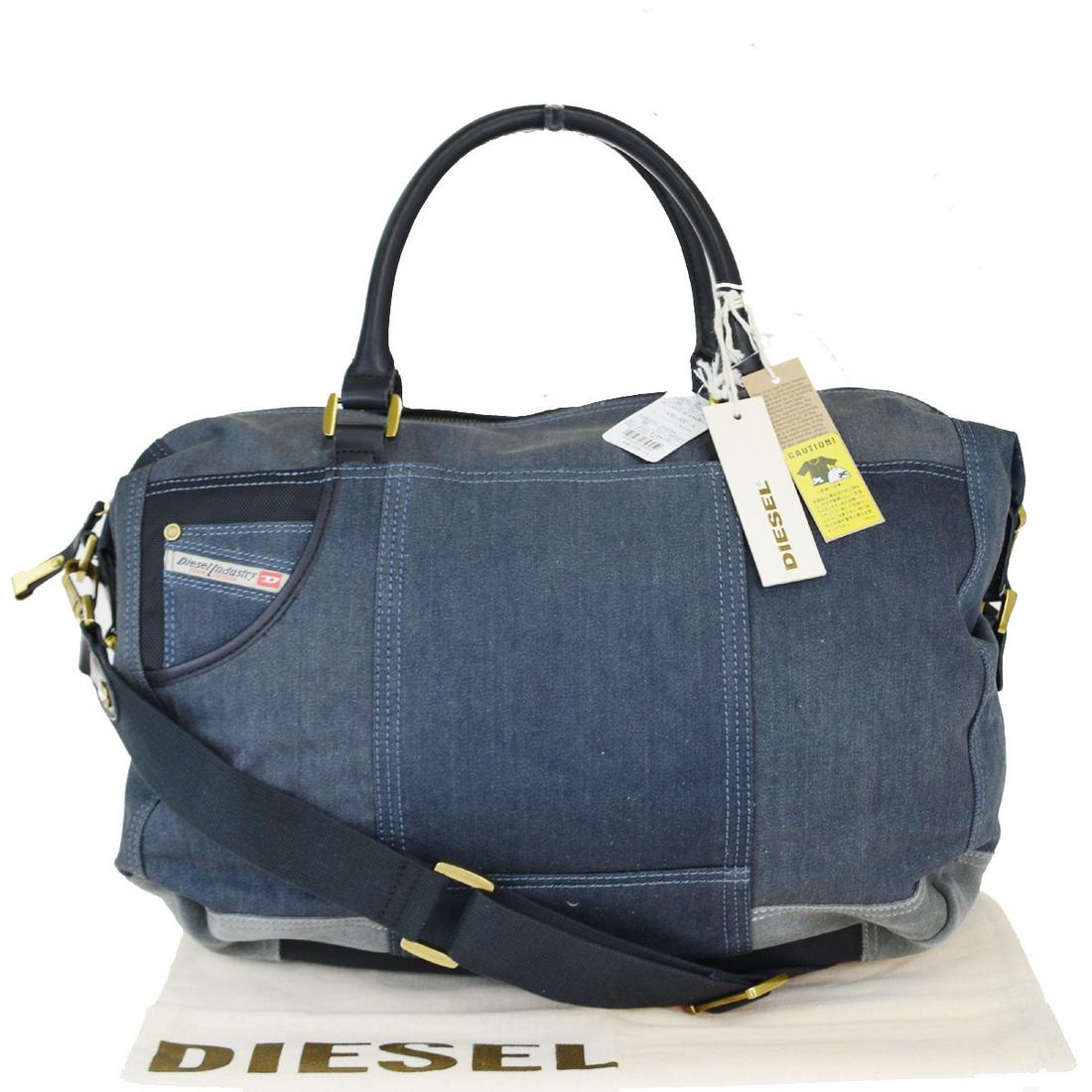 Authentic Diesel 2WAY Canvas,Leather Handbag Blue: Brand: Diesel Model: 2WAY Type: Handbag Accessories: Dust bag, Shoulder strap Condition: Used (acceptable) Material: Canvas ,Leather ,Suede ,Nylon Color: Blue Size (HxWxD): 36cm x 42cm x 19cm / 14.17'