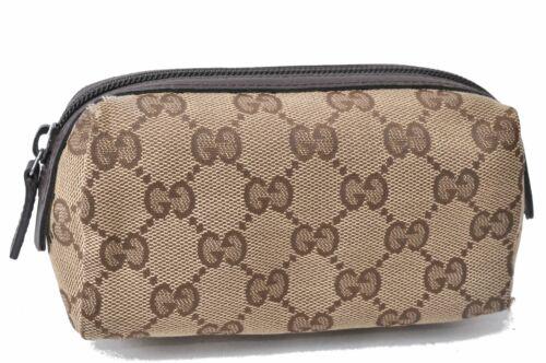 Authentic GUCCI Pouch GG Canvas Leather 29596 Brown: This item qualifies for FREE DOMESTIC SHIPPING to customers in the USA Brand: Gucci Style: Pouch Country/Region Of Manufacture: Italy Type: Pouch Serial Number: 29596205027 Department: Women Bag Lengt