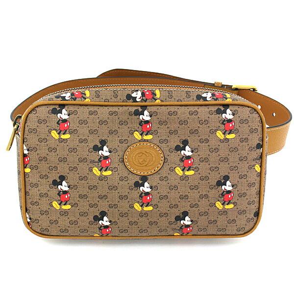 Authentic Gucci DISNEY x Mickey print belt bag 602695: Brand: Gucci Accessories: Box, Control card, Dust bag Condition: Opened (never used) Material: GG Supreme Color: Beige, Black, Red color Size (HxWxD): 14cm x 25cm x 6cm / 5.51'' x 9.84'' x 2.36'' Weig