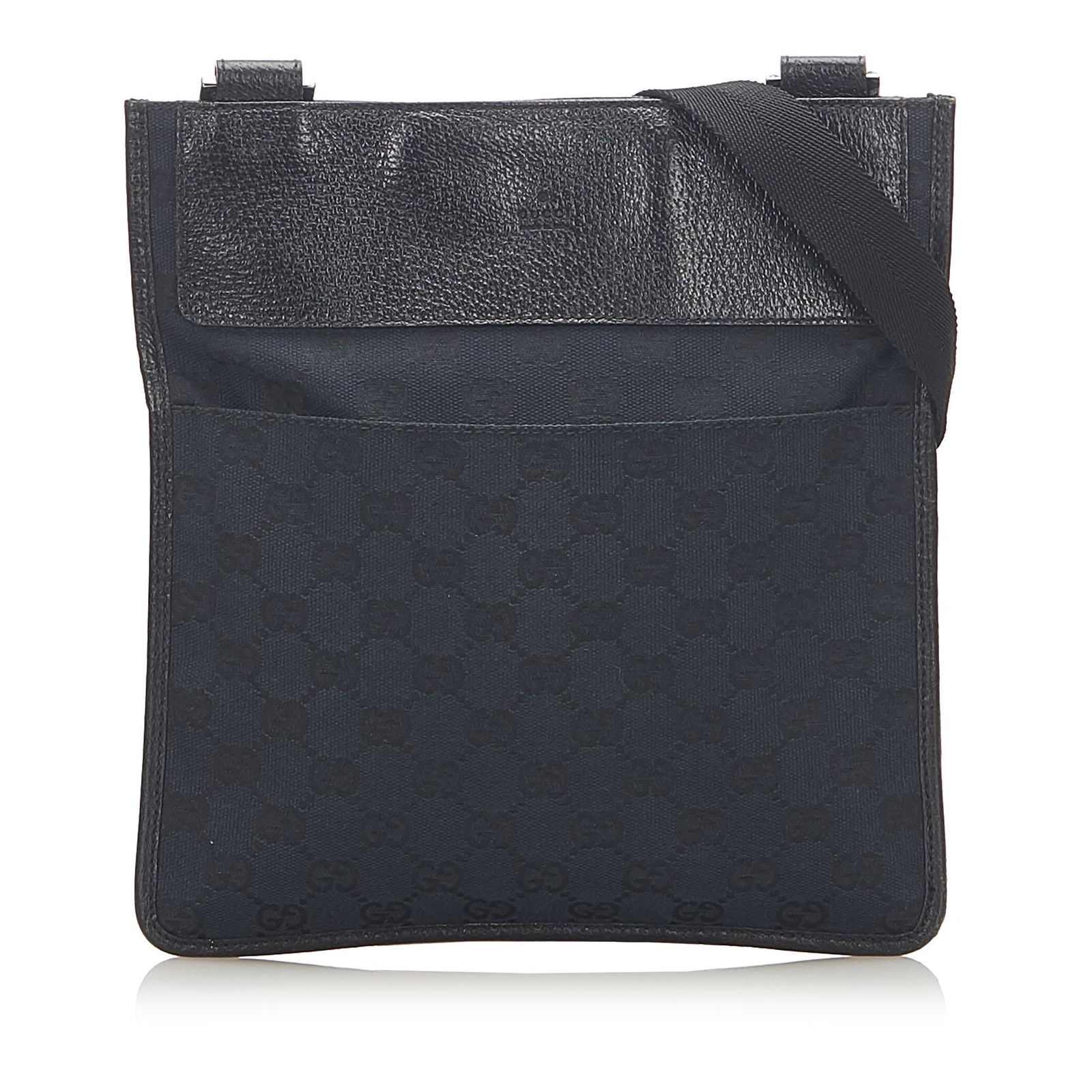 Authentic Gucci GG Canvas Crossbody Bag: This item qualifies for FREE DOMESTIC SHIPPING to customers in the USA The GG crossbody bag features a canvas body with leather trim an exterior front slip pocket an adjustable flat strap a top zip cl