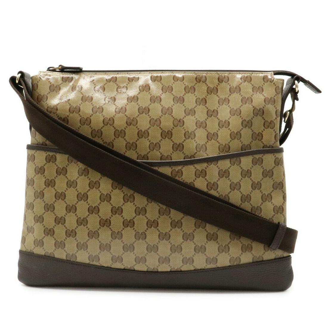 Authentic GUCCI GG Crystal Shoulder Bag Coated Canvas: This item qualifies for FREE DOMESTIC SHIPPING to customers in the USA Brand: Gucci Type: Shoulder bag Condition: Used (very good) Line: GG Crystal Material: Coated canvas ,Leather Color: Beige, Dark