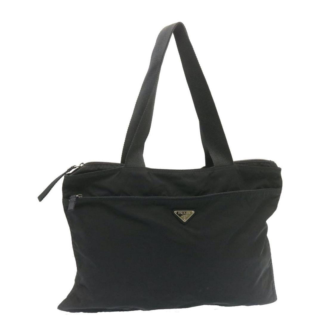 Authentic PRADA Tote Bag Nylon Black: This item qualifies for FREE DOMESTIC SHIPPING to customers in the USA Brand: PRADA Style: Tote Bag Material: Nylon Color: Black Made In: Italy Size (Inches): W17.3 x H11.8 x D5.5inch(Approx) / Handle