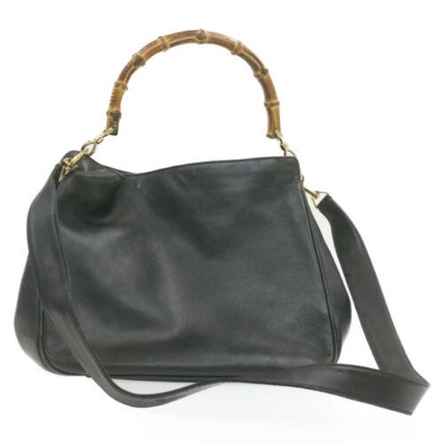 Authentic GUCCI Bamboo Hand Bag Shoulder Bag 2way: This item qualifies for FREE DOMESTIC SHIPPING to customers in the USA Brand: Gucci Size: W30 X H25 X D9Cm / Shoulder Drop 47Cm(Approx) Color: Black Country/Region Of Manufacture: Italy Material: Leat