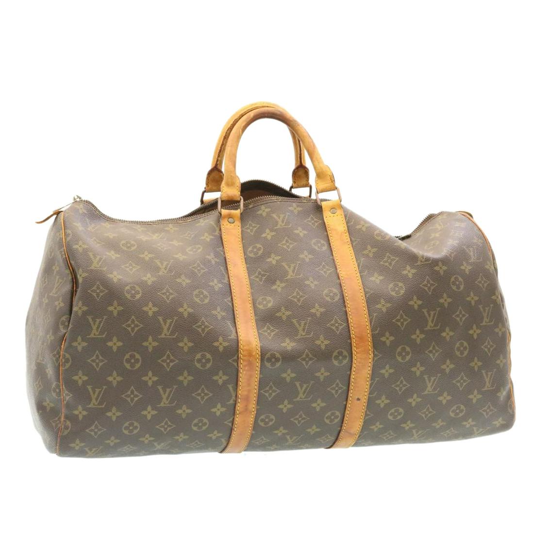 Authentic LOUIS VUITTON Monogram Keepall 55 Boston Bag: This item qualifies for FREE DOMESTIC SHIPPING to customers in the USA Brand: LOUIS VUITTON Style: Boston Bag Material: Monogram Canvas Color: Monogram Made In: USA Size (Inches): W21.7 x H10.6 x D9.8