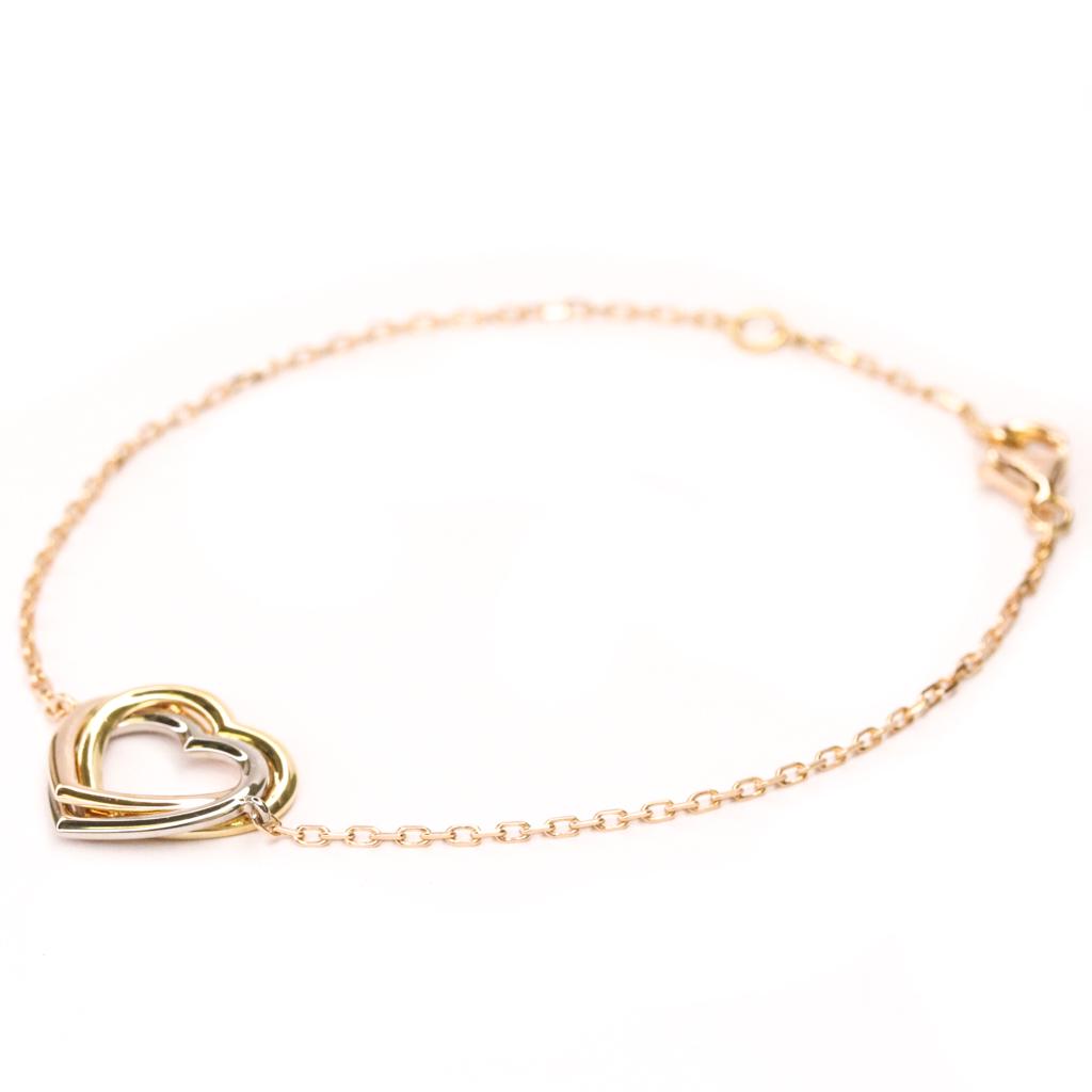 Authentic Cartier Trinity Heart Bracelet B6034500 Pink: This item qualifies for FREE DOMESTIC SHIPPING to customers in the USA Brand: Cartier Model: Trinity Heart Bracelet B6034500 Type: Charm bracelet Material: Pink gold (18K), White gold (18K), Yellow go