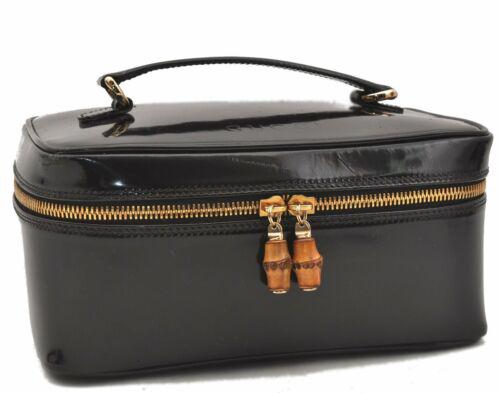 Authentic GUCCI Bamboo Vanity Bag Enamel Black: This item qualifies for FREE DOMESTIC SHIPPING to customers in the USA Brand: GUCCI Bag Height: 4.3inches (11cm) Material: Enamel Bag Depth: 5.5inches (14cm) Style: Vanity Bag Color: Black Serial Numb