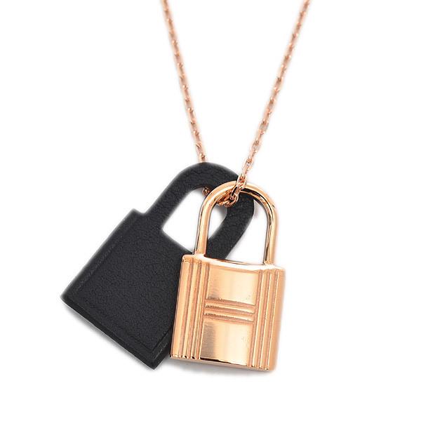 Authentic Hermes Oakley Necklace Metal Swift Rose Gold: This item qualifies for FREE DOMESTIC SHIPPING to customers in the USA Brand: Hermes Material: Metal, Swift leather Color: Black, Rose gold Condition: Opened (never used) Accessories: Box Weight: 6.5g