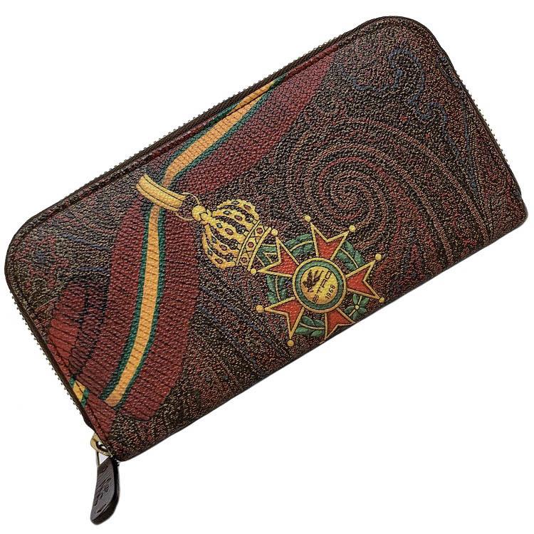 Authentic Etro Round Fastener Long Wallet Brown Paisley: This item qualifies for FREE DOMESTIC SHIPPING to customers in the USA Brand: Etro Type: Long wallet (bi-fold) Material: PVC ,Leather Color: Brown Size (HxWxD): 10cm x 19cm / 3.93'' x 7.48'' Condition